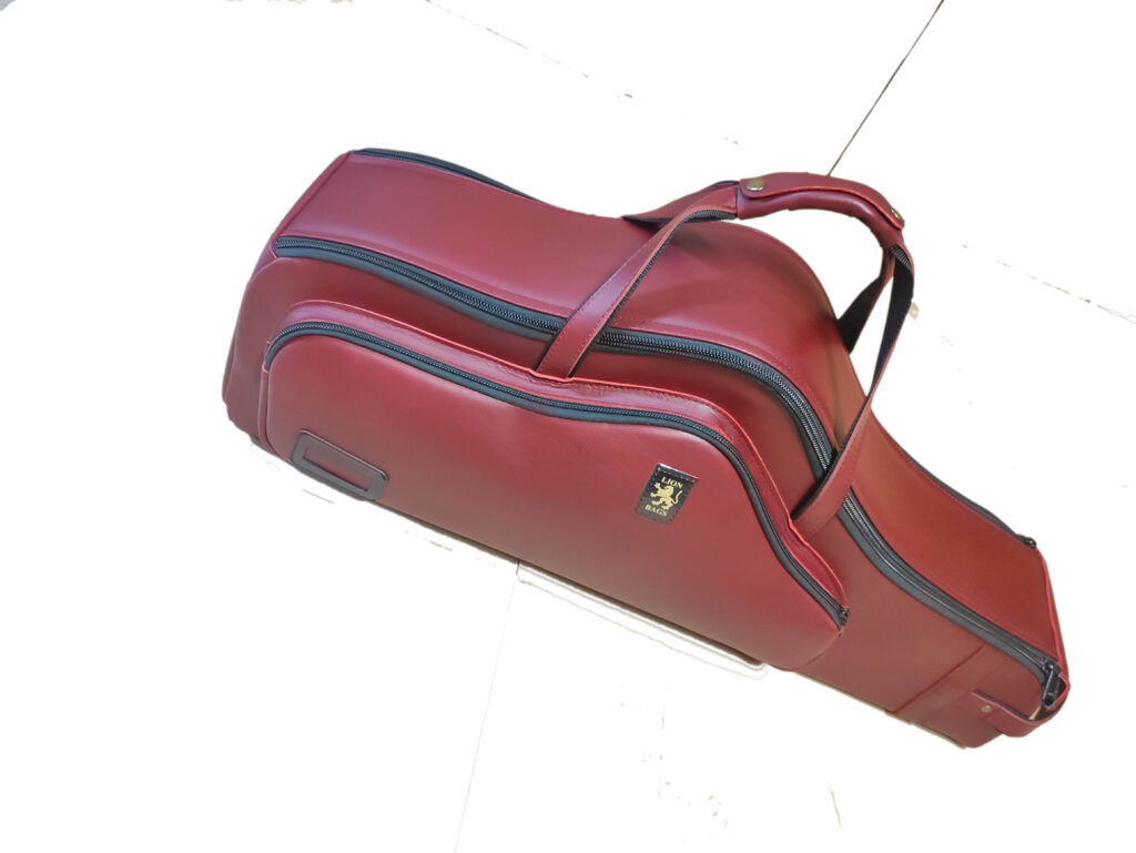 Burgundy leather tenor saxophone case
